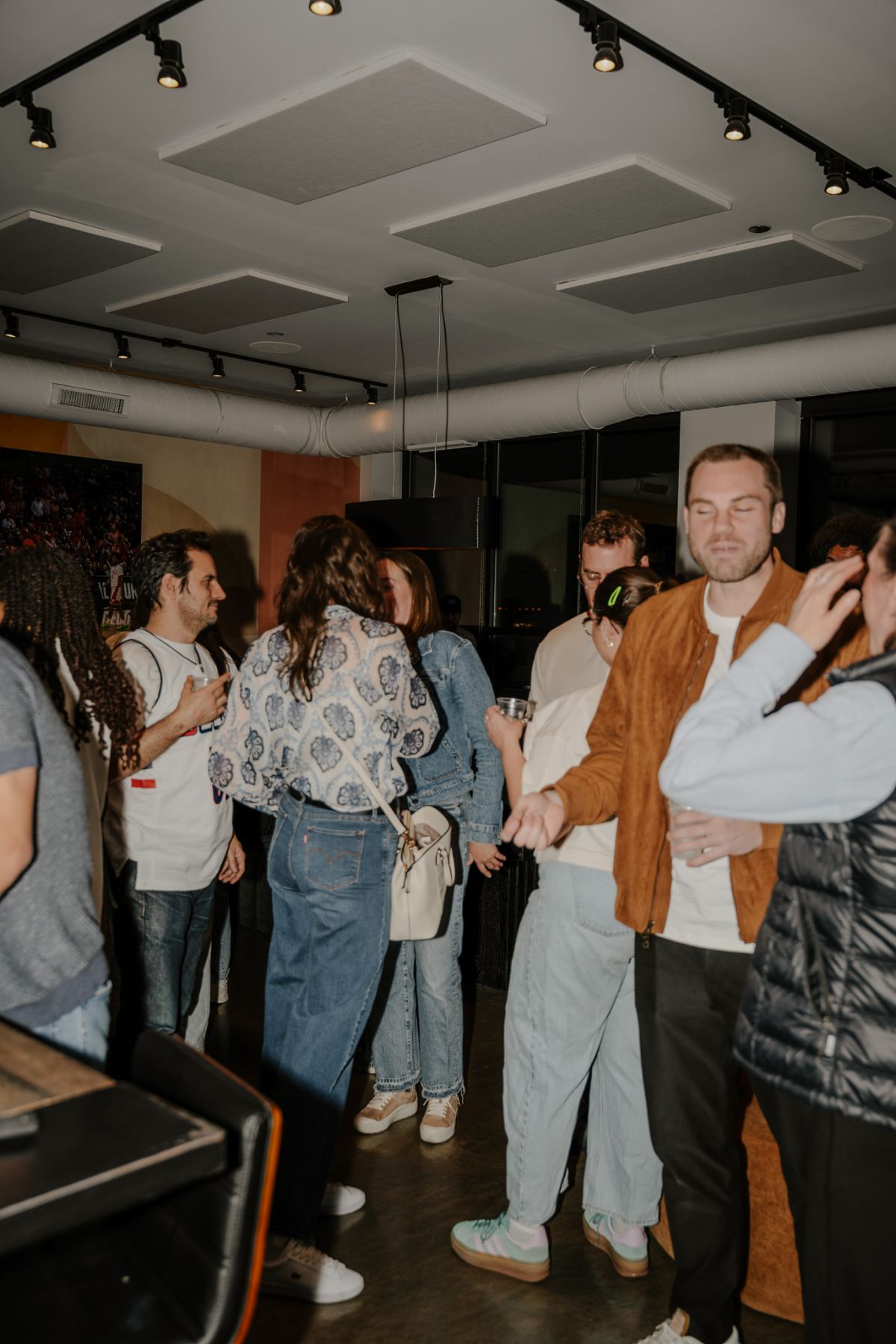 A packed Friday happy hour at the Three Cities clubhouse